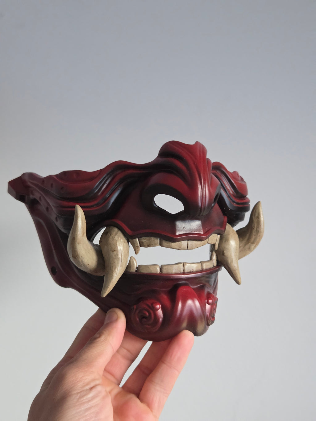Burgundy Oni Half-Mask with Cream Teeth