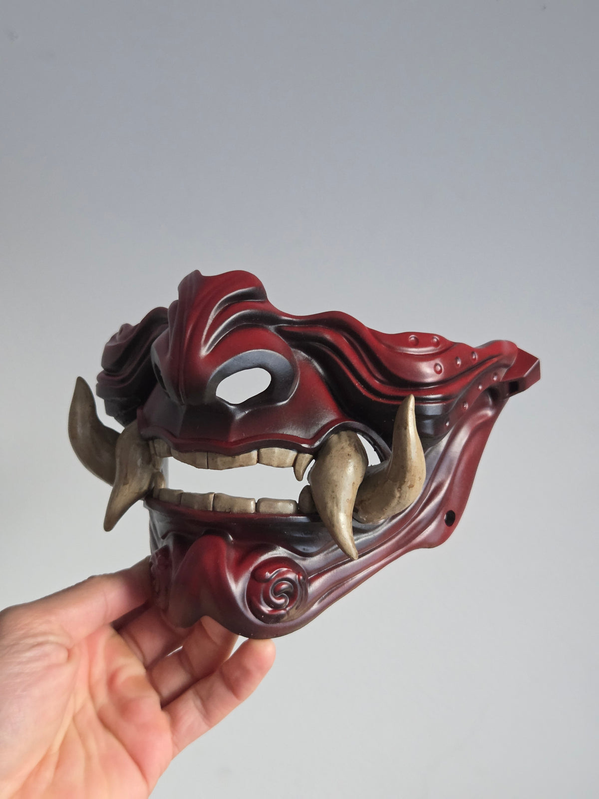 Burgundy Oni Half-Mask with Cream Teeth