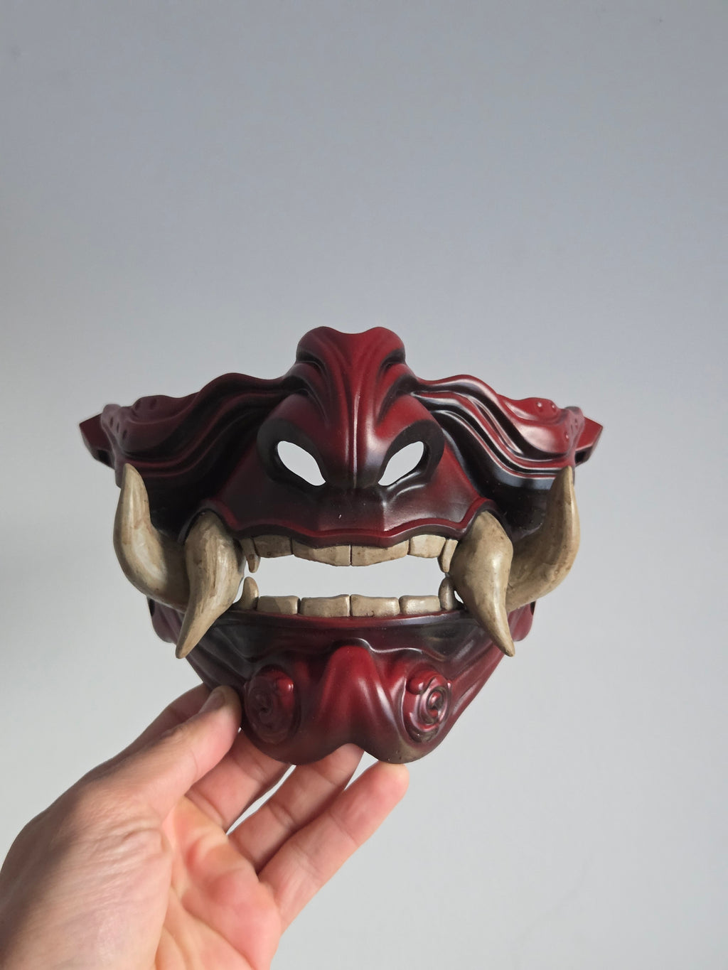 Burgundy Oni Half-Mask with Cream Teeth