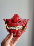 Red Translucent Oni Half-Mask with Gold Teeth