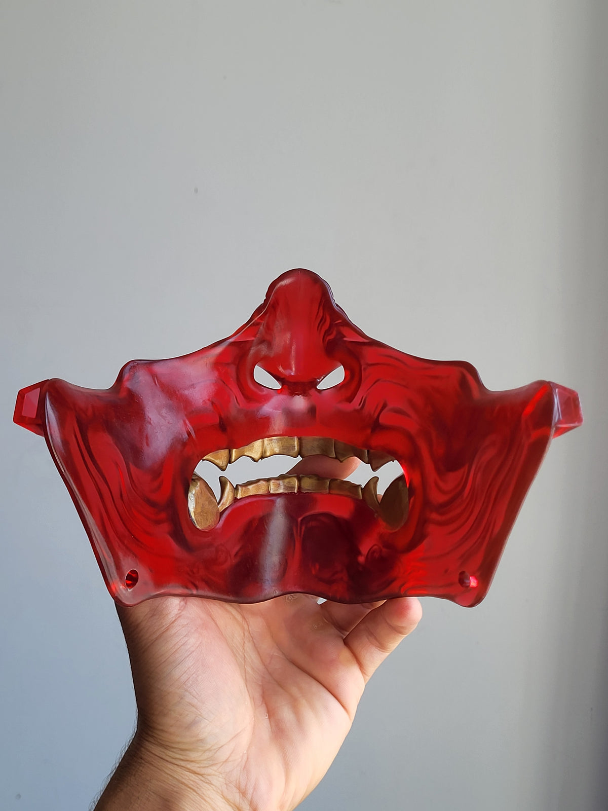 Red Translucent Oni Half-Mask with Gold Teeth
